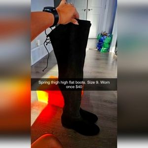 Thigh high flat boot